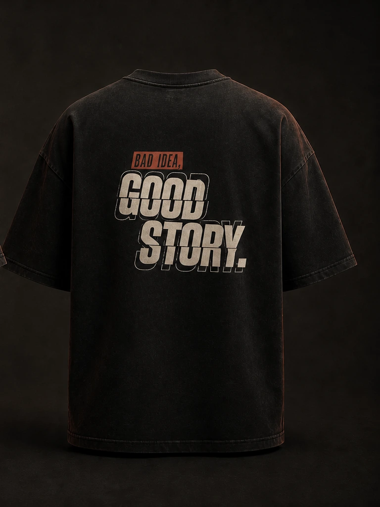 Back of the tee in compact distressed street lettering: Bad idea, above Good story.