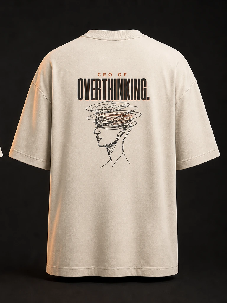Back of the tee with compact black lettering and a scribbled line-art profile: CEO of overthinking.