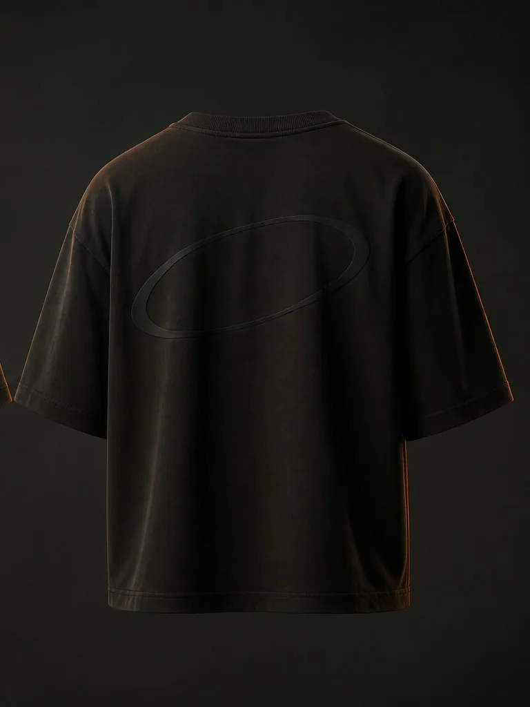 Back of the Field Tee: a large tonal orbit outline below the shoulder blades, almost black on black.