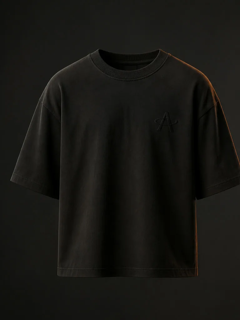 Front of the Black Soil Field Tee: a small tonal Magnetic A at the left chest.