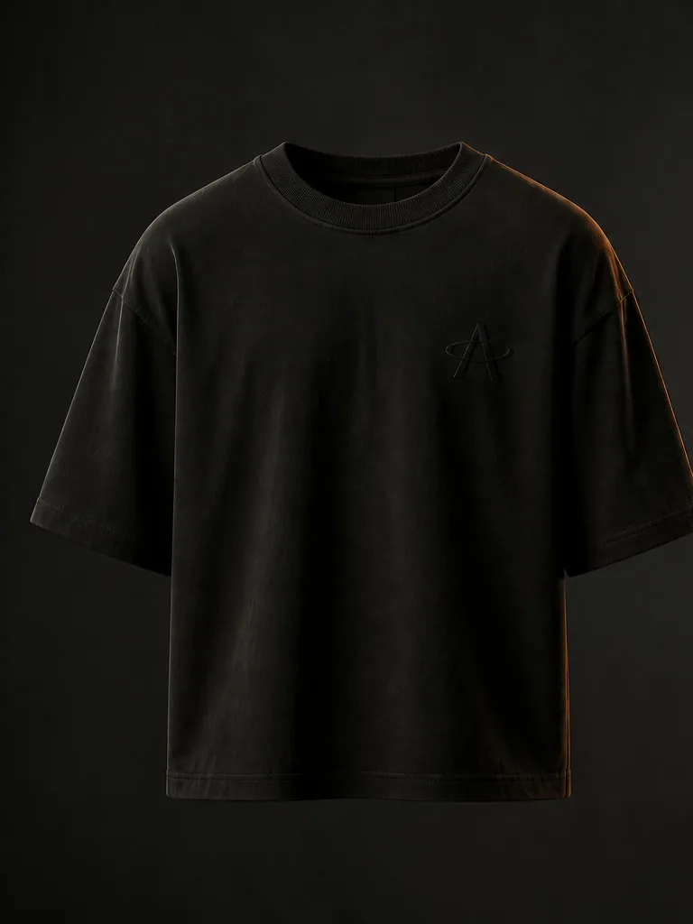 Front of the Black Soil oversized tee: a small tonal Magnetic A at the left chest.